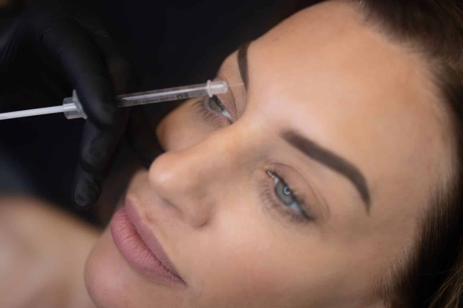 Woman getting botox in fort collins to reduce fine lines