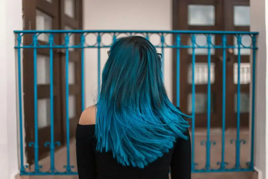 Girl with blue hair at our Fort Collins hair salon